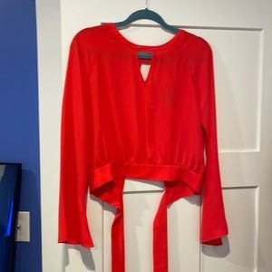 Hot red blouse, open back with bow. Flowy sleeves